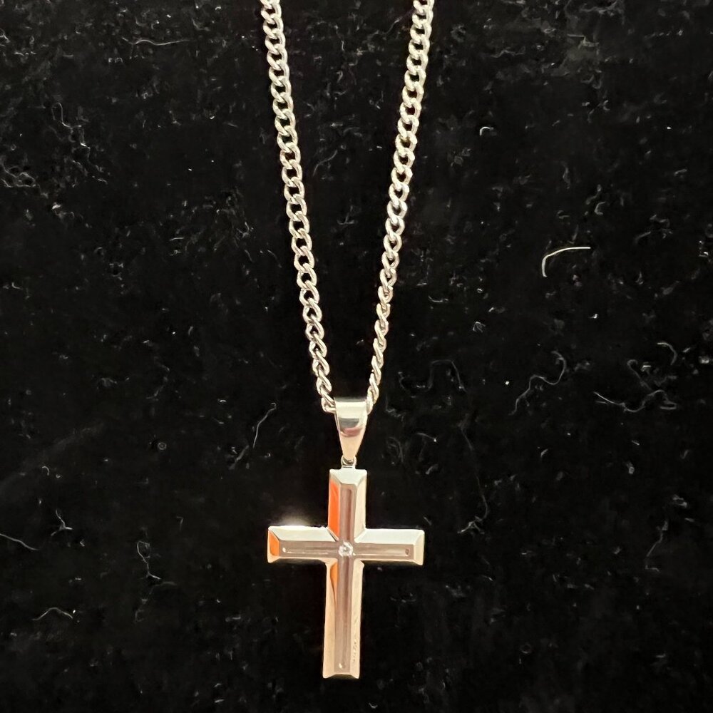 Silver Cross accented with a diamond